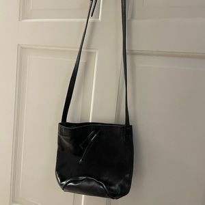 Fashionable (Able Clothing) small drawstring purse. Crossbody